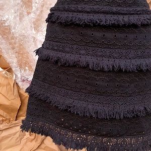 Eyelet and Tiered Fringe Mini Skirt